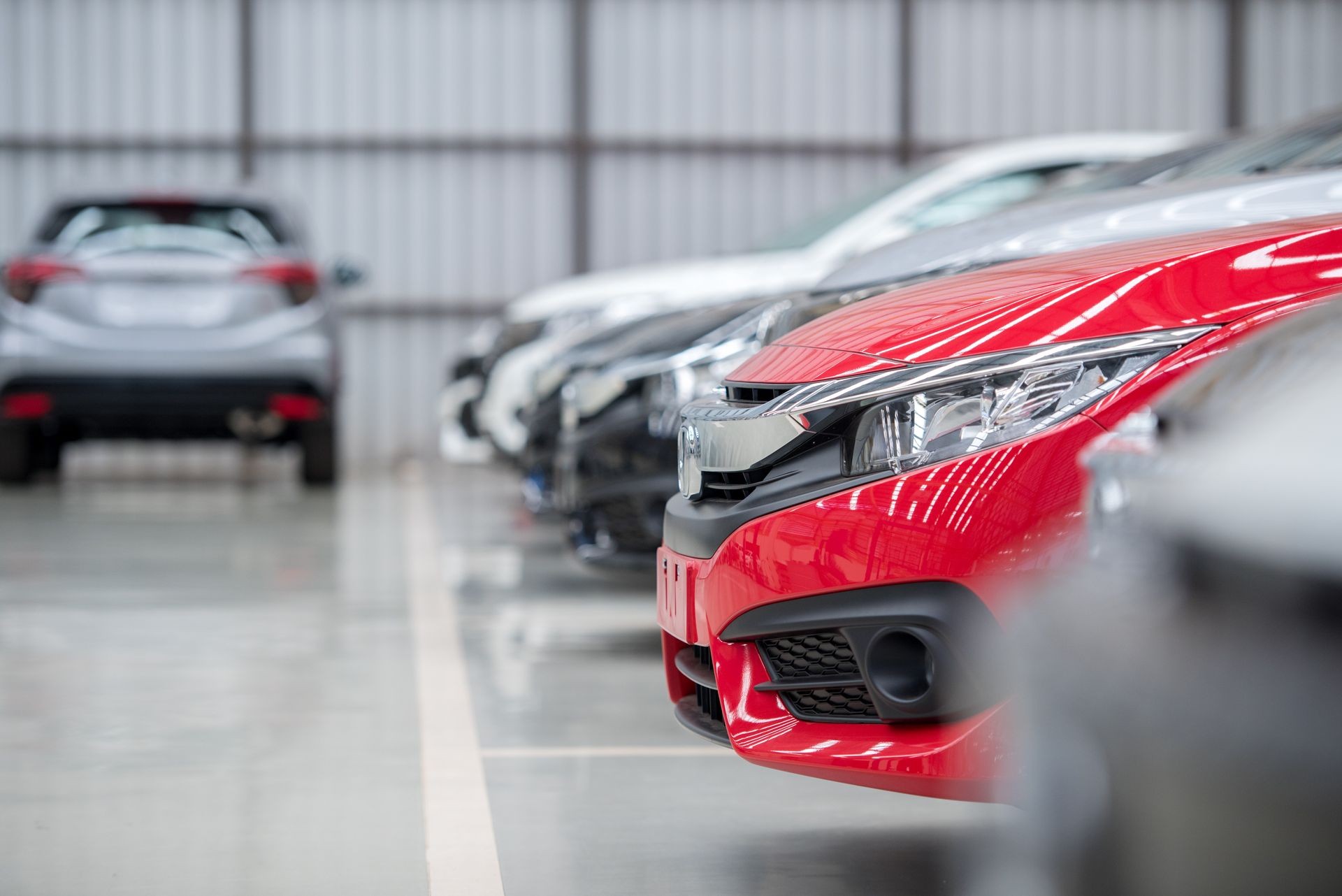 Red car at new car showroom
